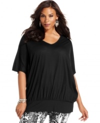 INC's plus size tunic adds a little spice to any outfit, with it's fluid draping and alluring tie-back neckline! INC's plus size tunic adds a little spice to any outfit, with it's fluid draping and alluring tie-back neckline!