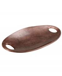 Add allure and sophistication to any event with Nambe serveware. Crafted of alloy and finished in beautiful bronze, this Heritage pebble tray from Nambe combines old-world elegance with a large, modern shape for easy serving in style.