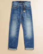 Slight distressing and worn-in details make this a must-have cotton denim style. Front button closureAdjustable waistband with belt loops and detachable key chainZip flyFive-pocket styleBack logo patchCottonMachine washImported
