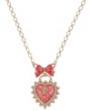 Show your heart's in the right place with this pendant necklace from Betsey Johnson. The chain is crafted from gold-tone mixed metal and the pendant is outlined with glass pearls and accents. A pink bow with gold-tone details enhances the look. Approximate length: 16 inches + 3-inch extender. Approximate drop: 2-1/2 inches.