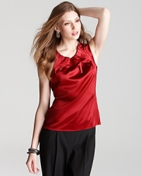 A knife pleated neckline adds texture to the Elie Tahari Winona top, the perfectly effortless blouse that you'll reach for time and time again. A knife pleated neckline adds texture to the Elie Tahari Winona top, the perfectly effortless blouse that you'll reach for time and time again.