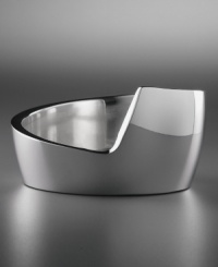 Like a grand spiral staircase, this Nambé wine coaster commands attention in any setting. Lustrous metal alloy retains the chill of the freezer and heat of the oven, making an elegant and clever cradle for cold wine or hot sake. Shown right. Like a grand spiral staircase, this Nambé wine coaster commands attention in any setting. Lustrous metal alloy retains the chill of the freezer and heat of the oven, making an elegant and clever cradle for cold wine or hot sake. Shown right.