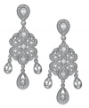 Be seen. Eliot Danori's elegant statement earrings catch light with crystal accents and cubic zirconia stones (2-1/5 ct. t.w.). Crafted in silver tone rhodium-plated mixed metal. Approximate drop: 1-3/4 inches.