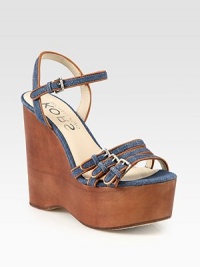 Skinny, adjustable straps in dazzling denim with leather trim and a towering wooden wedge. Wooden wedge, 5 (125mm)Wooden platform, 2 (50mm)Compares to a 3 heel (75mm)Denim and leather upperLeather lining and solePadded insoleImported Skinny, adjustable straps in dazzling denim with leather trim and a towering wooden wedge. Wooden wedge, 5 (125mm)Wooden platform, 2 (50mm)Compares to a 3 heel (75mm)Denim and leather upperLeather lining and solePadded insoleImported
