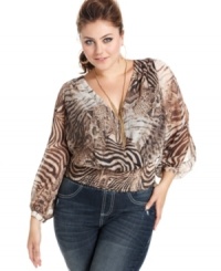 Awaken your wild side with Baby Phat's long sleeve plus size top, featuring an animal-print. Awaken your wild side with Baby Phat's long sleeve plus size top, featuring an animal-print.