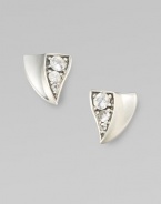 From the Thorn Collection. Triangular, thorn-shaped studs of gleaming sterling silver, with a concave profile on one side and sparkling white sapphires on the other.White sapphireSterling silverLength, about ½Post backImported