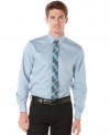 This slim fit patterned button down by Perry Ellis will have everyone at the office checking out your style.