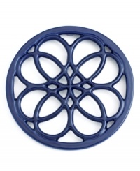 This quaint cast iron trivet, a charming piece to place on any countertop or dining table, features a classic pattern that protects virtually any surface from hot pots and pans. Limited lifetime warranty. (Clearance) This quaint cast iron trivet, a charming piece to place on any countertop or dining table, features a classic pattern that protects virtually any surface from hot pots and pans. Limited lifetime warranty. (Clearance)