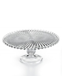 The Swirl cake stand steals the spotlight at casual tables with fluted detail, beaded trim and a look of antique grace. From Martha Stewart Collection. The Swirl cake stand steals the spotlight at casual tables with fluted detail, beaded trim and a look of antique grace. From Martha Stewart Collection.