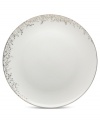 Fringed with shimmering leaves of platinum and mica, these bone china dinner plates from Mikasa turns your table into a springtime utopia. Its sleek coupe shape is a vision of modern elegance in platinum-banded white.