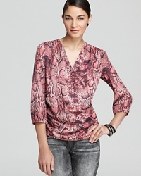 A crossover neckline, chic shirring and on-trend print give this Aqua shirt all the style it needs to be called must have this season. Perfect for your work-to-weekend wardrobe, it pairs with ankle pants perfectly, then complements your distressed skinnies with finesse. A crossover neckline, chic shirring and on-trend print give this Aqua shirt all the style it needs to be called must have this season. Perfect for your work-to-weekend wardrobe, it pairs with ankle pants perfectly, then complements your distressed skinnies with finesse.
