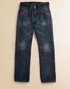 Relaxed, slim-fitting stonewashed cotton with subtle fading is a cool look for day or night. Front button closureAdjustable waistband with belt loopsZip flyFive-pocket styleBack logo patchCottonMachine washImported