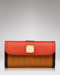 Master the heritage trend with this leather wallet from MCM. A striking, statement piece, this accessory flaunts a bold design and pockets for all the essentials. Master the heritage trend with this leather wallet from MCM. A striking, statement piece, this accessory flaunts a bold design and pockets for all the essentials.