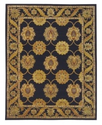 Bring home thousands of years of rug-making heritage with this spectacular area rug from Safavieh. Tufted in India from pure wool, this rug boasts a traditional motif of verdant blossoms that play boldly against a rich black ground. (Clearance) Bring home thousands of years of rug-making heritage with this spectacular area rug from Safavieh. Tufted in India from pure wool, this rug boasts a traditional motif of verdant blossoms that play boldly against a rich black ground. (Clearance)