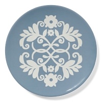 A decorative pattern adorns this versatile salad plate, perfect for a medley of greens or a selection of juicy fruits.