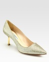 Glitter pumps with a point toe and goldtone metal-tip heel. Self-covered metal-tip heel, 2½ (65mm)Glitter-coated suede upperPoint toeLeather lining and solePadded insoleMade in Italy