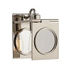 The contemporary design of this Ralph Lauren sconce reflects light off glass and bright nickel.