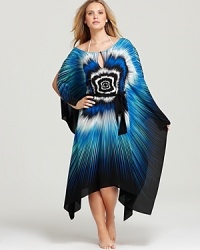 Exuding beach-bound glamour, Gottex's stunning Amethyst coverup showcases a bohemian caftan silhouette. Exuding beach-bound glamour, Gottex's stunning Amethyst coverup showcases a bohemian caftan silhouette.