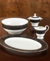 Make an unabashedly dramatic statement at your table with the soup bowl (not shown) from the Mikasa Elegant Scroll Dinnerware Collection, which plays a lively vine pattern against a deep ebony background.