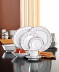 The formal Crestwood Platinum dinnerware and dishes set from Noritake embellishes crisp white china with a shimmering border of interlocking scrolled leaves and an edge of polished platinum. The formal Crestwood Platinum dinnerware and dishes set from Noritake embellishes crisp white china with a shimmering border of interlocking scrolled leaves and an edge of polished platinum.