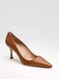 A classic design of rich leather you'll wear again and again.Self-covered heel, 2¾ (70mm) Pointed toe Leather lining and sole Padded insole Made in ItalyOUR FIT MODEL RECOMMENDS ordering one half size up as this style runs small. A classic design of rich leather you'll wear again and again.Self-covered heel, 2¾ (70mm) Pointed toe Leather lining and sole Padded insole Made in ItalyOUR FIT MODEL RECOMMENDS ordering one half size up as this style runs small.