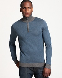 Casual style goes luxe in a mockneck teal sweater from BOSS Black. A half-zip neckline and contrasting collar and cuffs add a sporty accent. Casual style goes luxe in a mockneck teal sweater from BOSS Black. A half-zip neckline and contrasting collar and cuffs add a sporty accent.