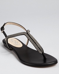 Silvery chains add a hint of hardware to KORS Michael Kors' Zanna sandals, a heavy hitting style with instant downtown edge. Silvery chains add a hint of hardware to KORS Michael Kors' Zanna sandals, a heavy hitting style with instant downtown edge.