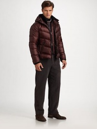 A sporty, sophisticated puffer style featuring an attached hood for added warmth.Zip frontAttached hoodSide slash zipper pocketsRemovable vest insertAbout 24 from shoulder to hemNylonDry cleanImported A sporty, sophisticated puffer style featuring an attached hood for added warmth.Zip frontAttached hoodSide slash zipper pocketsRemovable vest insertAbout 24 from shoulder to hemNylonDry cleanImported