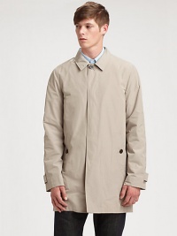 An iconic Burberry Brit style featuring a button front, convenient front pockets and a back vent.Collar neckButton-tab on long sleevesButtoned flap pocketsBack ventFully linedAbout 36 from shoulder to hemPolyesterMachine washImported An iconic Burberry Brit style featuring a button front, convenient front pockets and a back vent.Collar neckButton-tab on long sleevesButtoned flap pocketsBack ventFully linedAbout 36 from shoulder to hemPolyesterMachine washImported