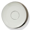 A hand-painted crescent of stunning platinum rims the edges of this thoroughly modern dinnerware collection.