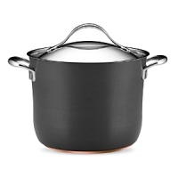 This Nouvelle cookware collection from Anolon features hard-anodized construction in a versatile, elegant shape for perfectly even heating and exceptional cooking performance. Each piece is designed with a double full cap base with a copper core for optimum heat control, and two layers of ultradurable aluminum. Restaurant-tested Autograph® 2 nonstick interiors ensure easy, clean release, and cast stainless-steel handles secured with sturdy dual rivets make each piece easy to maneuver and transport. This Nouvelle cookware collection from Anolon features hard-anodized construction in a versatile, elegant shape for perfectly even heating and exceptional cooking performance. Each piece is designed with a double full cap base with a copper core for optimum heat control, and two layers of ultradurable aluminum. Restaurant-tested Autograph® 2 nonstick interiors ensure easy, clean release, and cast stainless-steel handles secured with sturdy dual rivets make each piece easy to maneuver and transport.