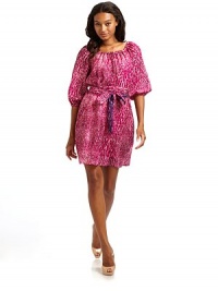 Snakeskin patterns add punch to this chiffon creation, with a contrasting wrap-around sash at the waist.Drawstring round neckline Elbow-length puff sleeves Contrasting waist sash wraps twice Fully lined About 33½ from shoulder to hem Silk; dry clean Imported Snakeskin patterns add punch to this chiffon creation, with a contrasting wrap-around sash at the waist.Drawstring round neckline Elbow-length puff sleeves Contrasting waist sash wraps twice Fully lined About 33½ from shoulder to hem Silk; dry clean Imported