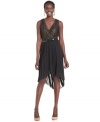 SL Fashions' dress is on-trend with a shimmering metallic lace bodice and a pleated high-low skirt.