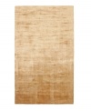Presenting a rich, classic gold in soft viscose, the Beckett area rug from Lauren Ralph Lauren offers a chic ground ripe for enhancing any modern setting. Durable enough to withstand heavy indoor traffic, yet luxuriously soft underfoot.