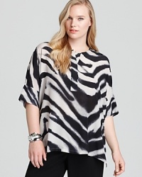 A vibrant blaze of zebra print lends exotic inspiration to this Lafayette 148 New York top. Punctuate the graphic silhouette with acid-bright accents and take charge of the fashion pack. A vibrant blaze of zebra print lends exotic inspiration to this Lafayette 148 New York top. Punctuate the graphic silhouette with acid-bright accents and take charge of the fashion pack.