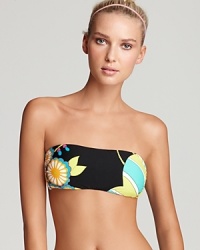 A dramatically appealing print defines this Trina Turk bandeau bikini top. A dramatically appealing print defines this Trina Turk bandeau bikini top.