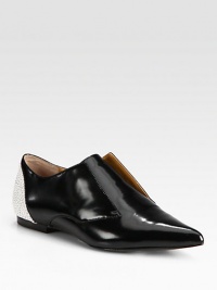 This two-tone leather staple is modernized with a refined point toe, laceless construction and pebbled detailing. Leather upperPoint toeLeather lining and solePadded insoleImported This two-tone leather staple is modernized with a refined point toe, laceless construction and pebbled detailing. Leather upperPoint toeLeather lining and solePadded insoleImported