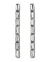 Elegant Art Deco inspiration defines these divine linear baguette crystal earrings from Swarovski. Set in silver tone mixed metal, they're an ideal look for a stylish soiree! Approximate length: 2-4/10 inches.