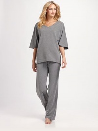 This plush style features pretty dolman sleeves and a flattering v-neckline. V-neckShort dolman sleevesPull-on styleSeamed detail on backAbout 28 from shoulder to hem63% polyester/33% viscose/4% elastaneMachine washImported This plush style features pretty dolman sleeves and a flattering v-neckline. V-neckShort dolman sleevesPull-on styleSeamed detail on backAbout 28 from shoulder to hem63% polyester/33% viscose/4% elastaneMachine washImported