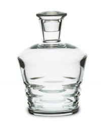 Classic technique, modern beauty. Crafted of fine Baccarat crystal, the Lola decanter pairs horizontal wedge cuts with a silhouette that radiates grace and sophistication. Classic technique, modern beauty. Crafted of fine Baccarat crystal, the Lola decanter pairs horizontal wedge cuts with a silhouette that radiates grace and sophistication.