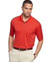 The perfect partner. Pair up with this shirt from Greg Norman, featuring moisture management, for a winning day on the links.