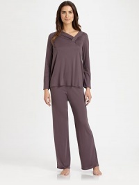 Soft-stretch cotton silhouette with an asymmetrical neckline and ruched details for a contemporary look. Asymmetrical ruched necklineLong sleevesElasticized waistband50% cotton/50% micromodalMachine washImported Soft-stretch cotton silhouette with an asymmetrical neckline and ruched details for a contemporary look. Asymmetrical ruched necklineLong sleevesElasticized waistband50% cotton/50% micromodalMachine washImported