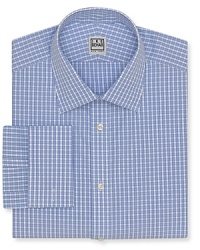 A tried-and-true check pattern lends traditional appeal to this finely tailored dress shirt from Ike Behar, crafted with a regular fit and a comfortable drape. Pair with a silk tie for a strong professional look. A tried-and-true check pattern lends traditional appeal to this finely tailored dress shirt from Ike Behar, crafted with a regular fit and a comfortable drape. Pair with a silk tie for a strong professional look.