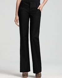 A wardrobe essential for fall, these Alice + Olivia wide leg pants are effortlessly chic with a wide waist band for comfort and side pockets for your style must-haves. A wardrobe essential for fall, these Alice + Olivia wide leg pants are effortlessly chic with a wide waist band for comfort and side pockets for your style must-haves.