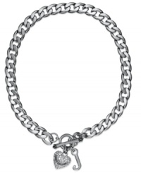 Show your love for Juicy Couture. This chunky collar necklace shines with the sleek sophistication of pave crystal-embellished heart and J logo charms. Chain crafted in stainless steel. Charms crafted in silver tone mixed metal with toggle clasp. Approximate length: 16 inches. Approximate drop: 1-3/4 inches. Show your love for Juicy Couture. This chunky collar necklace shines with the sleek sophistication of pave crystal-embellished heart and J logo charms. Chain crafted in stainless steel. Charms crafted in silver tone mixed metal with toggle clasp. Approximate length: 16 inches. Approximate drop: 1-3/4 inches.
