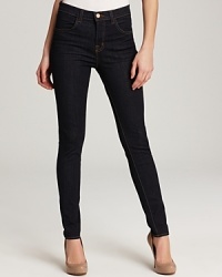 A high rise makes these super-skinny J Brand jeans the ideal companion to the season's sophisticated silk blouses--tucked in, of course. A high rise makes these super-skinny J Brand jeans the ideal companion to the season's sophisticated silk blouses--tucked in, of course.