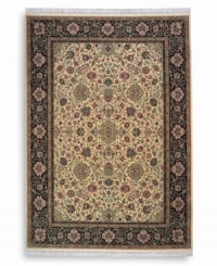 Inspired by the easily recognizable and intricately beautiful textiles of the Kirman region of ancient Persia, this Indo-Kirman rug features graceful floral designs in a rich palette of individually-dyed colors including indigo, soft blues, peach-corals, golds, lavender, and a multitude of soft greens. Patterned on an antique carpet woven circa 1910, it has a soft luster-wash that imparts a soft vintage finish. Inspired by the easily recognizable and intricately beautiful textiles of the Kirman region of ancient Persia, this Indo-Kirman rug features graceful floral designs in a rich palette of individually-dyed colors including indigo, soft blues, peach-corals, golds, lavender, and a multitude of soft greens. Patterned on an antique carpet woven circa 1910, it has a soft luster-wash that imparts a soft vintage finish.