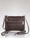 You've got the tough-girl attitude, now get a leather Rebecca Minkoff crossbody to match. Its shape is so night-now, its exposed zip details have serious bite.