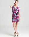 Blooming with oversized florals, this Lilly Pulitzer dress freshens your everyday look with a flattering wrap silhouette. Juxtapose the feminine print with a tough-girl leather jacket for the ultimate style mix.