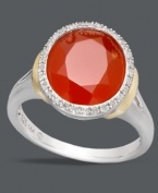 Make a bold statement in bright red hues. This flashy ring boasts a round-cut red agate center stone (3-5/8 ct. t.w.) encircled by round-cut diamonds (1/10 ct. t.w.). Crafted in sterling silver with 14k gold accents. Size 7.